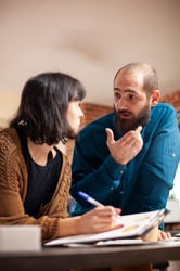 Two colleagues in a conversation