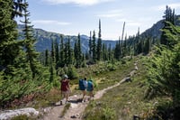 three people hiking