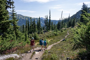 three people hiking