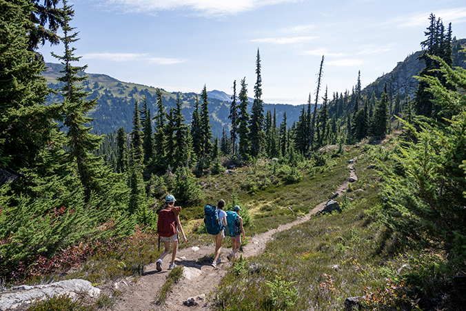 three people hiking