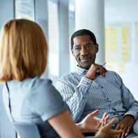 humble leader talking with employee