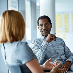 humble leader talking with employee
