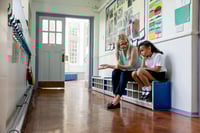 Teacher supporting a struggling student