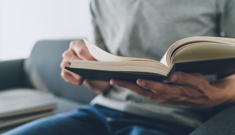 Student studying a book