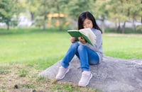 student reading in summer