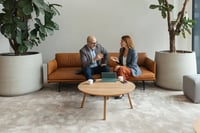 Two people engaging in conversation