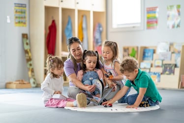 Teacher reading to children