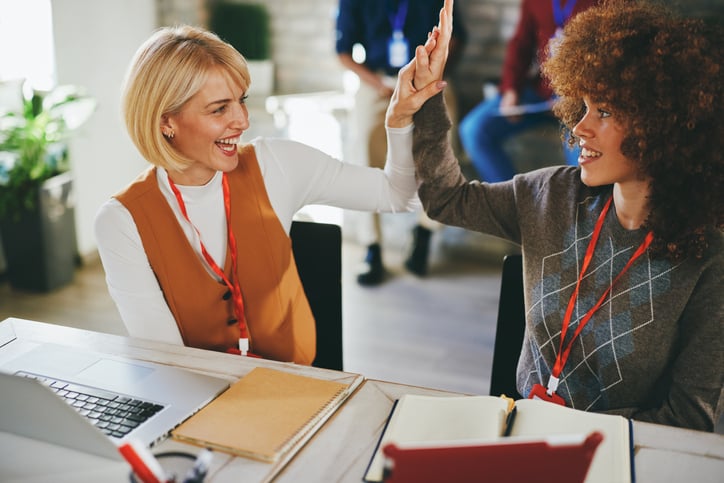 Teachers celebrating a successful collaboration session