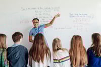Teacher teaching a math lesson