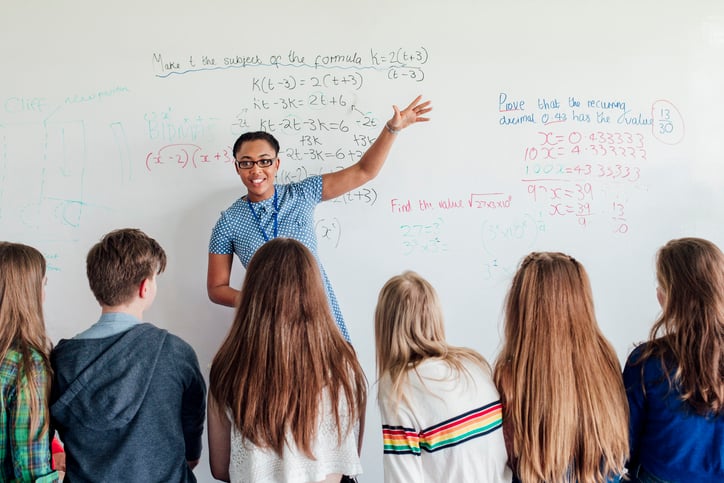 Teacher teaching a math lesson