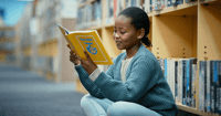 Student reading a book