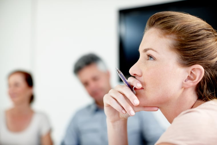 Someone actively listening in a meeting