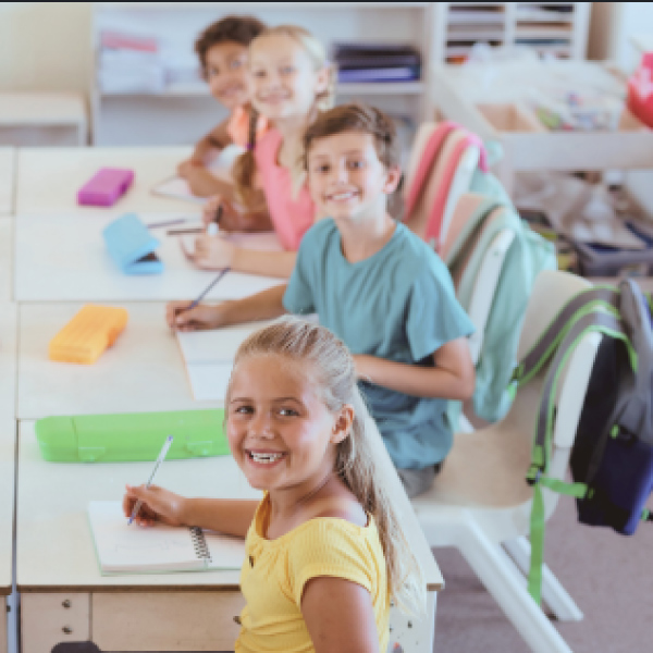 Table of students smiling