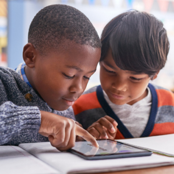 Two students reading together